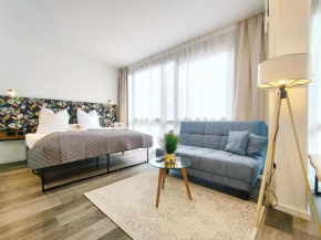 Design-Apartment für bis zu 4 im 1 OG, modern, Dachterrasse, Grill, ruhige Lage, Disney plus, Wii, LAN und WLAN